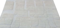Backside of handmade New Morocco rug showing knot structure and weave density
