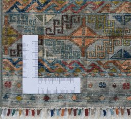 Corner detail of New Samarkand rug showing border pattern and Wool pile
