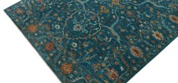Backside of handmade New Farahan rug showing knot structure and weave density