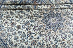 Close-up detail of New Nain rug from Iran / Persia showing Wool weave