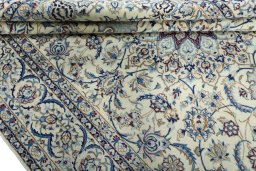 Close-up detail of 2000s Nain rug from Iran / Persia showing Wool weave