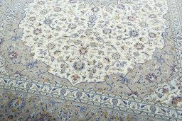Close-up detail of 2000s Kashan rug from Iran / Persia showing Wool weave