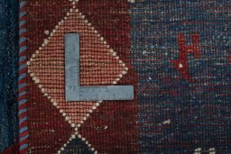 Close-up detail of 2000s Persian Gabbeh rug from Pakistan showing Wool weave