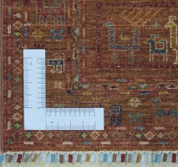 Corner detail of New Samarkand rug showing border pattern and Wool pile