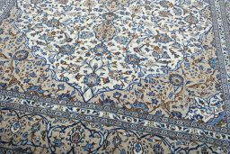 Close-up detail of 2000s Kashan rug from Iran / Persia showing Wool weave