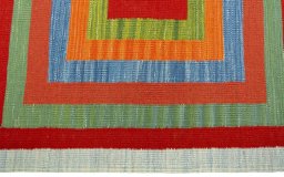 Close-up detail of New Kilim Sofre rug from Turkey showing Wool weave