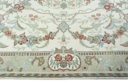 Corner detail of New Kashmar rug showing border pattern and Wool pile