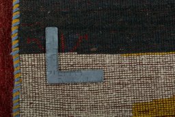 Close-up detail of 2000s Persian Gabbeh rug from Pakistan showing Wool weave