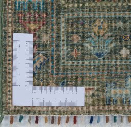 Corner detail of New Samarkand rug showing border pattern and Wool pile