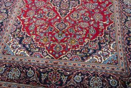 Close-up detail of 2000s Kashan rug from Iran / Persia showing Wool weave