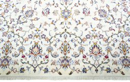 Full view of New Kashan rug from Iran / Persia, 305 × 194 cm in Beige tones