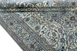 Close-up detail of 2000s Kashmar rug from Iran / Persia showing Wool weave