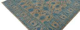Backside of handmade New Farahan rug showing knot structure and weave density