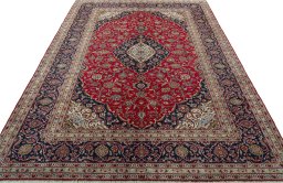 Surface texture of 2000s Kashan rug with natural Wool and intricate pattern