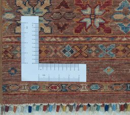 Corner detail of New Samarkand rug showing border pattern and Wool pile