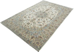 Corner detail of New Kashan rug showing border pattern and Wool pile