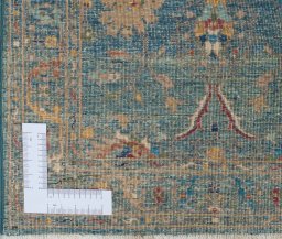 Corner detail of New Farahan rug showing border pattern and Wool pile