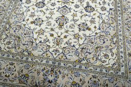 Close-up detail of 2000s Kashan rug from Iran / Persia showing Wool weave