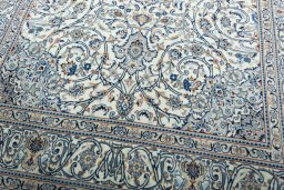 Close-up detail of 2000s Kashmar rug from Iran / Persia showing Wool weave