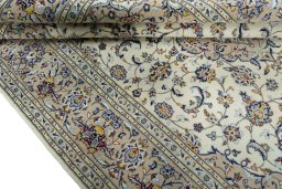 Close-up detail of 2000s Kashan rug from Iran / Persia showing Wool weave