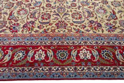 Corner detail of 1970s Kashan rug showing border pattern and Wool pile