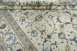 Close-up detail of 2000s Kashan rug from Iran / Persia showing Wool weave
