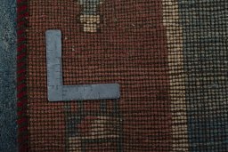 Close-up detail of 2000s Persian Gabbeh rug from Pakistan showing Wool weave