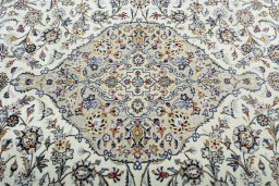 Central medallion detail of 2000s Kashan rug from Iran / Persia