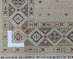 Corner detail of New Samarkand rug showing border pattern and Wool pile