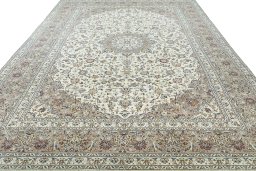 Surface texture of 2000s Kashan rug with natural Wool and intricate pattern