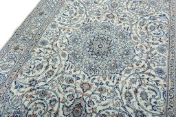 Backside of handmade 2000s Kashmar rug showing knot structure and weave density