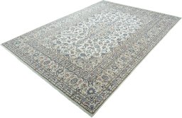 Corner detail of 2000s Kashan rug showing border pattern and Wool pile