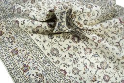 Surface texture of 2000s Kashan rug with natural Wool and intricate pattern