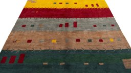 Surface texture of 2000s Persian Gabbeh rug with natural Wool and intricate pattern