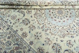 Close-up detail of 2000s Nain rug from Iran / Persia showing Wool weave
