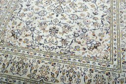 Close-up detail of 2000s Kashan rug from Iran / Persia showing Wool weave