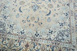 Close-up detail of 2000s Nain rug from Iran / Persia showing Wool weave