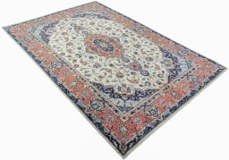 Close-up detail of 2000s Kashan rug from Iran / Persia showing Wool weave