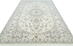 Surface texture of 2000s Nain rug with natural Wool and intricate pattern