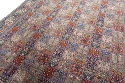 Backside of handmade 2000s Moud rug showing knot structure and weave density