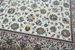 Close-up detail of 2000s Mashad rug from Iran / Persia showing Wool weave
