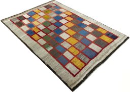 Close-up detail of 2000s Persian Gabbeh rug from Pakistan showing Wool weave