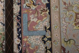 Central medallion detail of New Tabriz 50/60/70 Raj rug from Iran / Persia