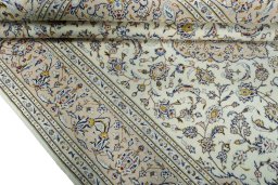 Close-up detail of 2000s Kashan rug from Iran / Persia showing Wool weave