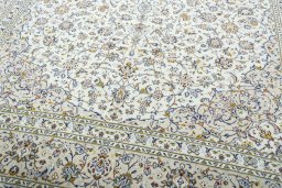 Close-up detail of 2000s Kashan rug from Iran / Persia showing Wool weave