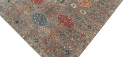 Backside of handmade New Kazak rug showing knot structure and weave density