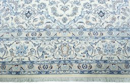 Full view of New Nain rug from Iran / Persia, 395 × 297 cm in Beige tones