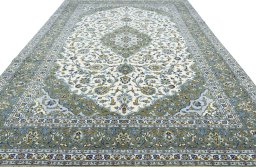 Surface texture of 2000s Kashan rug with natural Wool and intricate pattern