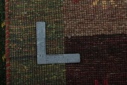 Close-up detail of 2000s Persian Gabbeh rug from Pakistan showing Wool weave