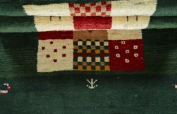 Full view of 2000s Persian Gabbeh rug from Pakistan, 165 × 105 cm in Multi Color tones